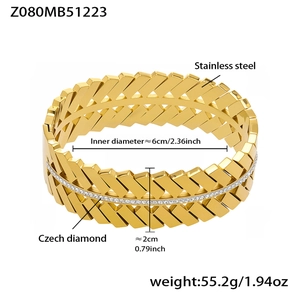 Detailed specs of geometric stainless steel bangle with inlaid zircons in 18k gold finish