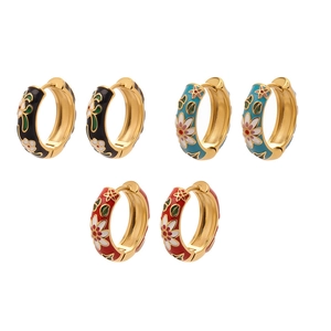 Enamel floral hoop earrings in gold finish with daisy patterns in three vibrant colors
