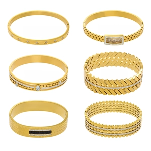 Set of six gold plated stainless steel geometric bangles with zircon and stone inlay