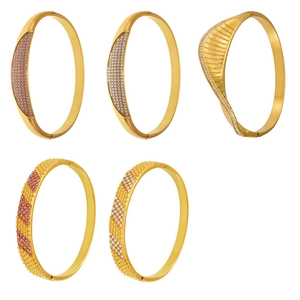 Stack of 18k gold plated stainless steel bangles with zircon inlay and geometric design
