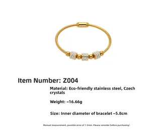 Detailed macro view of the gold-plated stainless steel snake chain bracelet with CZ stones