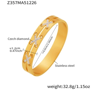 Macro detail of 18k gold plated stainless steel bangle featuring pavé Czech diamonds