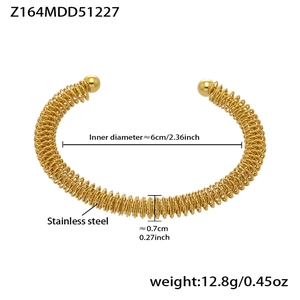 Detail showing dimensions of gold stainless steel twisted spring cuff bracelet