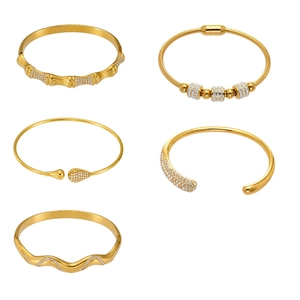 Set of five 18k gold plated stainless steel geometric bangles with cubic zirconia stones