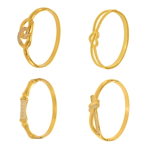 Set di quattro bracciali in acciaio inossidabile placcato oro 18k con motivi infinito e cuore