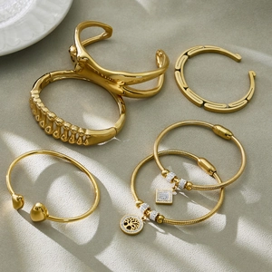 Bracciale albero della vita dorato e set di rigidi in acciaio inossidabile placcato 18k