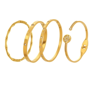 Set di quattro bracciali in acciaio inossidabile placcato oro 18k con disegni bambù e zirconi