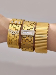 Three 18k gold plated stainless steel bangles with honeycomb textures and zircons