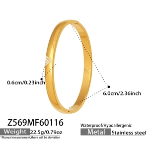 Detail showing 6.0cm inner diameter and 0.6cm width of a gold-plated zircon bangle