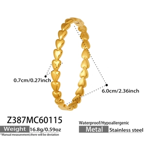 Detailed view of 18k gold-plated heart-shaped stainless steel bangle with dimensions