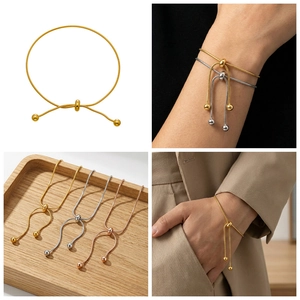 Detailed view of adjustable snake chain bracelets in gold, silver, and rose gold finishes
