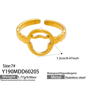Detail view of adjustable gold stainless steel ring with hollow circle and heart pattern