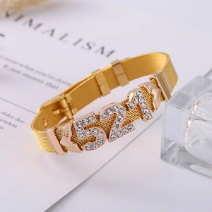 Detail of 10mm gold mesh band bracelet with sparkling 521 rhinestone numeral charms