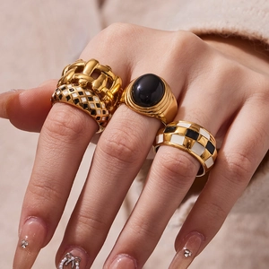 18k gold plated stainless steel rings with checkered enamel and black oval gemstone