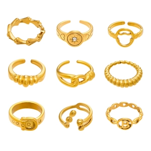 9-piece gold stainless steel ring set with geometric cutouts and minimalist designs