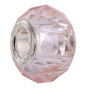 Close-up of pink faceted crystal bead with a large silver core for DIY jewelry making