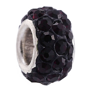 Macro shot of S925 sterling silver charm bead with four rows of sparkling purple crystals