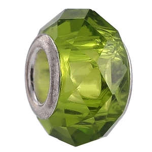 Detailed view of faceted green crystal bead with silver large-hole core for DIY bracelets
