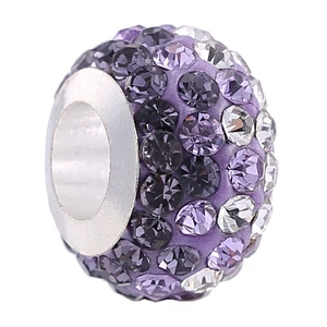 Macro shot of purple and white crystal pave charm bead with large hole for bracelets