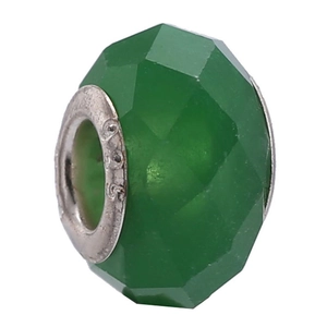Detail of faceted green resin bead with 925 silver metal core for DIY bracelet making