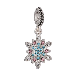 Detailed view of silver snowflake charm with pink and blue rhinestones for DIY jewelry