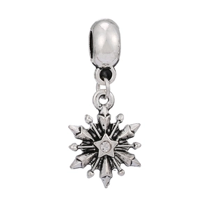 Detail of silver snowflake charm with star center and crystal for DIY jewelry
