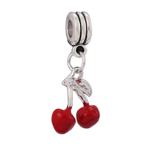 Macro detail of red cherry charm bead with silver large hole bail for DIY bracelets