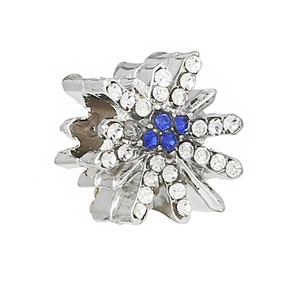 Detailed view of snowflake pendant with blue and clear crystals for DIY jewelry making