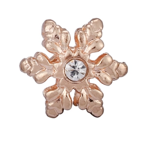 Detail of rose gold snowflake pendant charm with center crystal for jewelry making