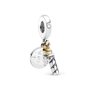 Detail of silver 'Make a Wish' disk and golden flame candle charm for DIY bracelets