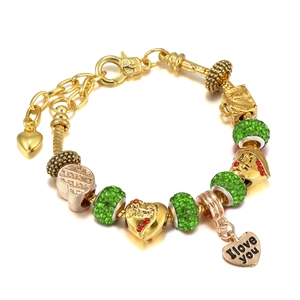 Detail of gold beaded bracelet with green crystal charms and I Love You heart pendant