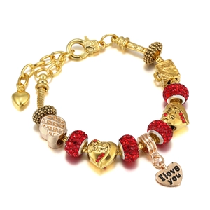 Detail of gold beaded bracelet with red pave crystals and I Love You heart charm