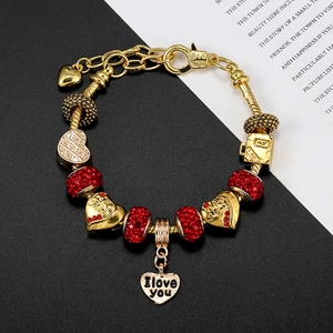 Elegant gold beaded bracelet with red rhinestones and I Love You heart charm