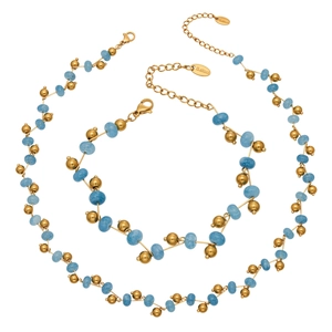 Handmade stainless steel jewelry set with gold beads and faceted sky blue crystal stones
