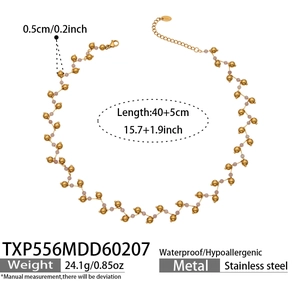 Collier ondulé en acier inoxydable avec perles de cristal rose et accents dorés