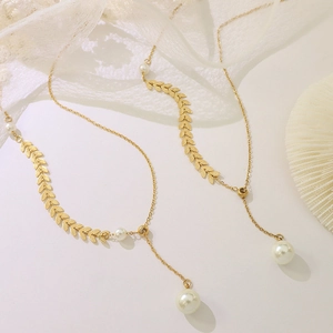 French style 18k gold plated titanium necklace with pearl accents and leaf shape charms