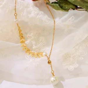 French style 18k gold plated titanium necklace with pearl accents and leaf design charms