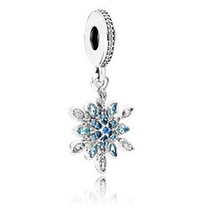 Detailed view of silver snowflake charm with blue crystals for DIY jewelry bracelets