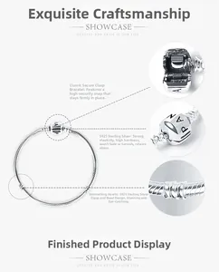 Close-up of S925 sterling silver snake chain bracelet showing clasp details and engravings