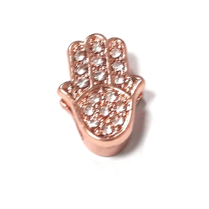 Detail of rose gold Hamsa Hand charm with pavé rhinestones for 10mm mesh bracelet