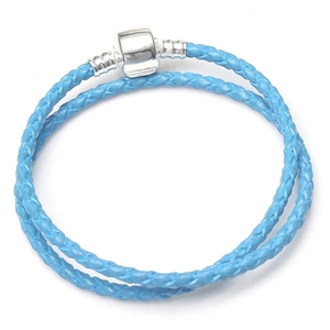 Close-up of sky blue double-wrap braided leather bracelet with silver cylindrical clasp
