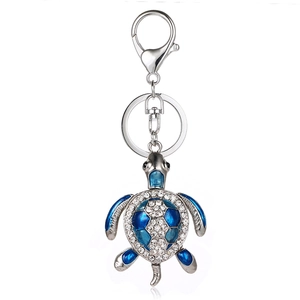 Silver turtle keychain with blue enamel shell and crystals for bags or car keys