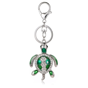 Green enamel turtle keychain with sparkling rhinestones and silver-tone metal hook