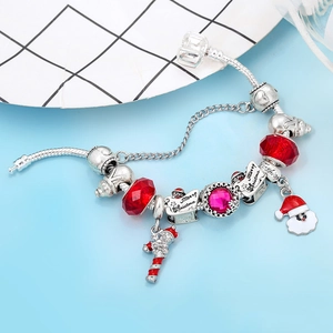Detailed Christmas charm bracelet with Santa, candy cane, and Merry Christmas tag