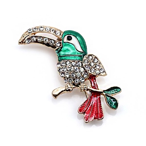 Golden tropical toucan brooch with vibrant red green enamel and sparkling rhinestones