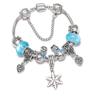 Silver snake chain bracelet with blue glass beads and snowman charms for winter Christmas gifts