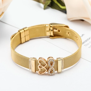 Detail of gold mesh strap bracelet featuring hollow heart and infinity symbol with zircons