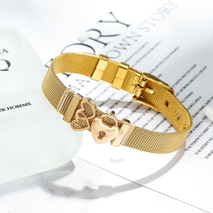 Golden mesh stainless steel bracelet featuring heart pendants and a watch-style buckle