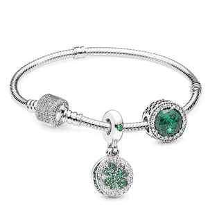 Silver snake chain bracelet with green clover charm and pave cubic zirconia slider