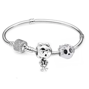 Silver skull charm bracelet with snake chain and cubic zirconia butterfly pendant
